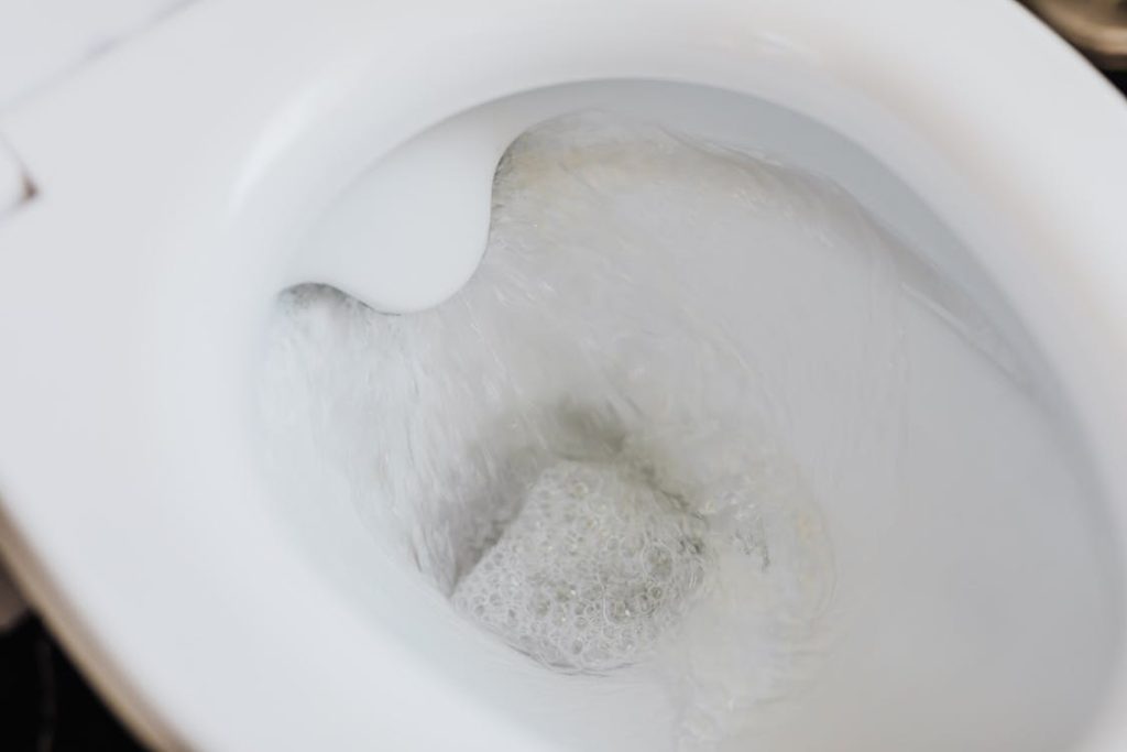 A flushed toilet
