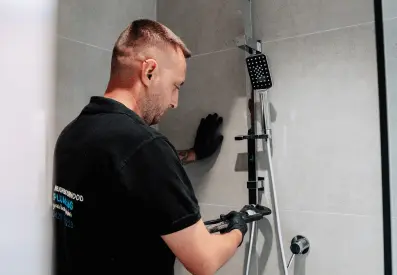 Melbourne plumber fixing the shower