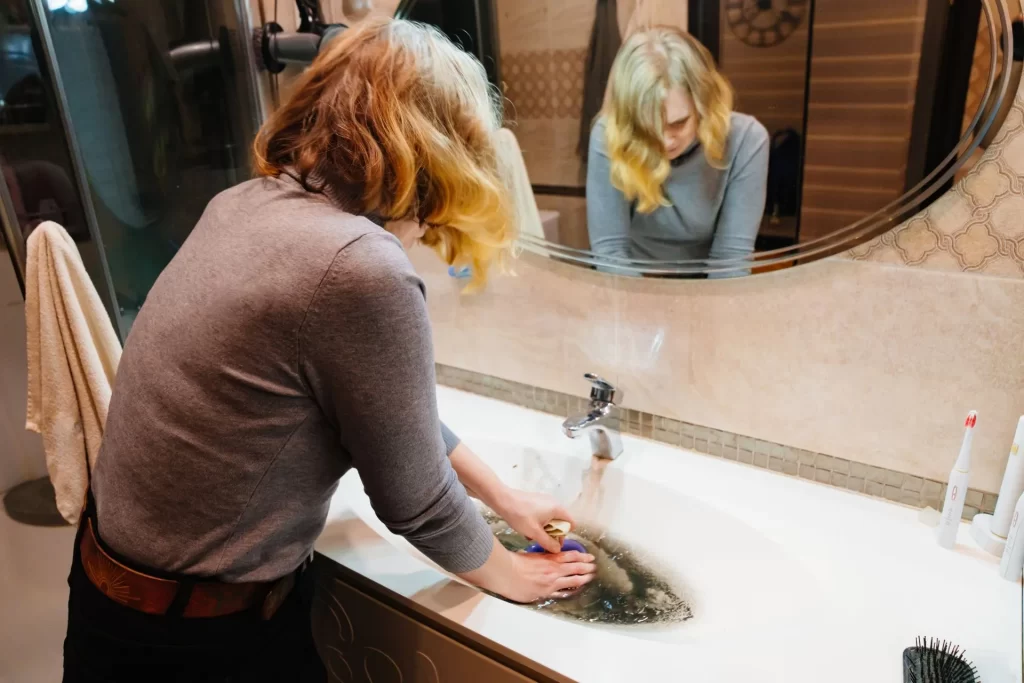 cleaning clogged bathroom sink